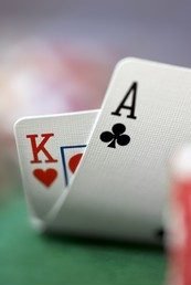 Ace and king playing cards — rummy bonus mechanics explained